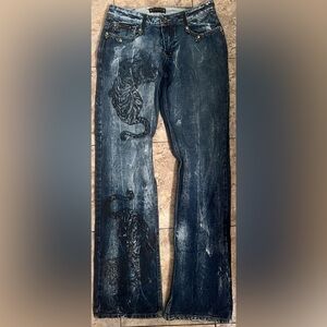 Philipp Plein Jeans with Skulls & Tigers. Skull button, skull back pockets.